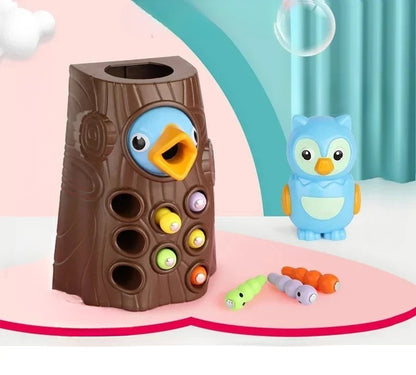 Toy owl with a tree-like structure and small toys on a colorful background