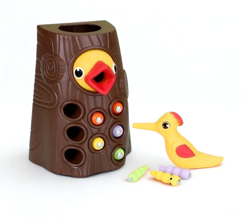 Toy tree with a duck face and colorful beads on a white background